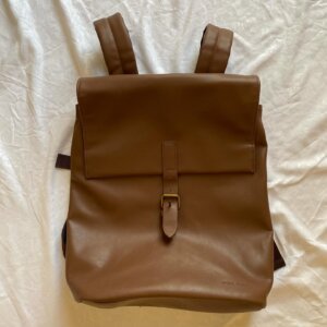 A leather backpack 🎒
