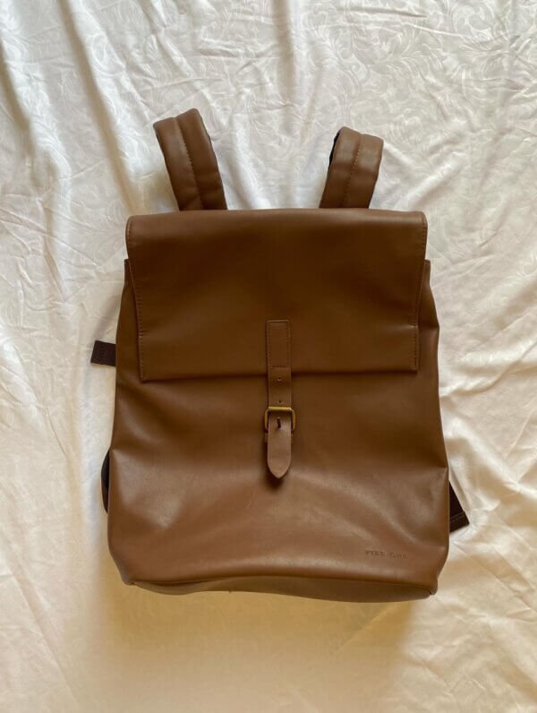 A leather backpack 🎒
